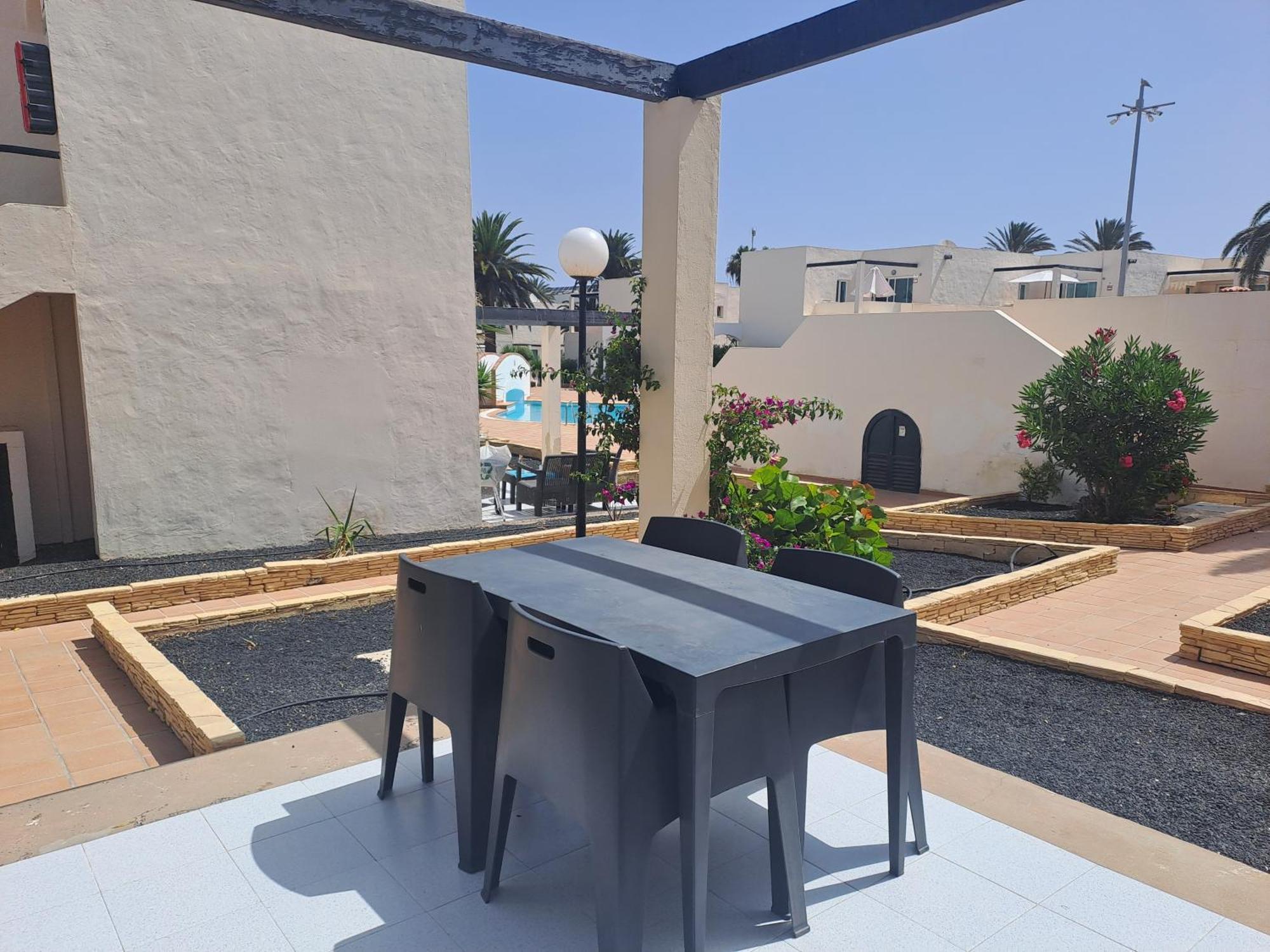 Apartamento con terraza y piscina en Corralejo Exterior foto